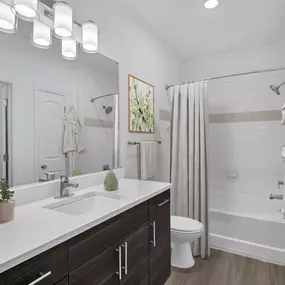 Bathroom with quartz countertop at Camden College Park apartments in College Park, MD