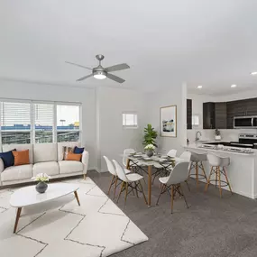 Contemporary style apartment home at Camden College Park in College Park, MD with carpet and wood-style flooring, ceiling fan, and stainless steel applicances