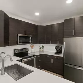 Contemporary style renovated apartment kitchen at Camden College Park