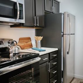 Fully Equipped Kitchen with Stainless Appliances