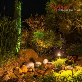 Landscape lighting design and installation with water features
