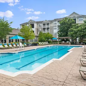 Pool with deck chairs