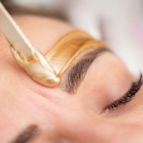 Eyebrow waxing works by applying warm (not hot) wax to areas of unwanted hair. Once the wax is applied to the direction of hair growth, a cloth strip is placed firmly on top. After a few seconds, the cloth is quickly pulled off in the opposite direction that your hair grows.