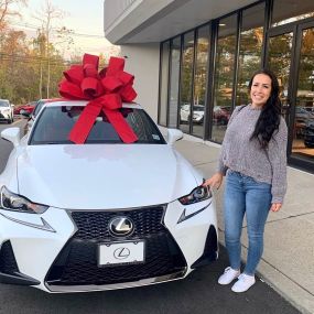 Another happy Lexus of Bridgewater customer picking up her brand new IS 300!