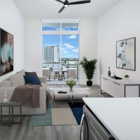Living area with private balcony in penthouse apartment homes at Camden Las Olas in Fort Lauderdale, FL