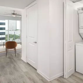Stacked washer and dryer in the studio apartments at Camden Las Olas in Fort Lauderdale, FL.