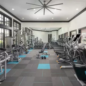 24 hour fitness center with cardio equipment and free weights