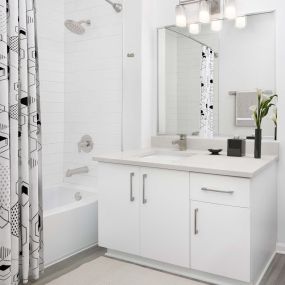 Modern Bathroom with white quartz countertops and brushed nickel fixtures at Camden St.Clair in Atlanta GA