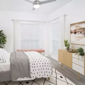 Modern bedroom with updated flooring and ceiling fan at Camden St. Clair in Atlanta GA