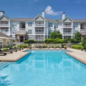 Salt water swimming pool with lounge seating