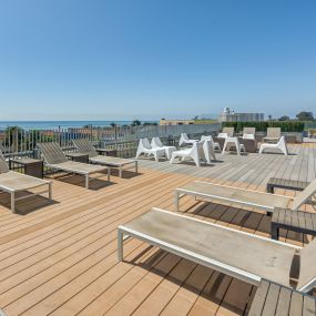 Spacious rooftop and ample seating with ocean views.