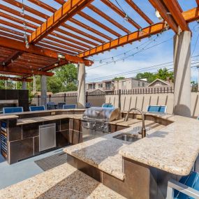 Outdoor Kitchen Area with Fireside Lounge