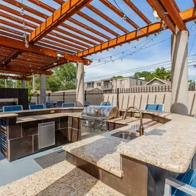 Outdoor Kitchen Area with Fireside Lounge