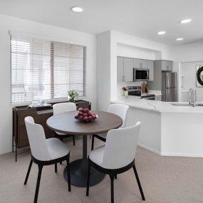 Dining room alongside kitchen at Camden Montierra apartments in Scottsdale, AZ