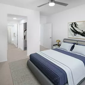 Bedroom with carpet, ceiling fan, and en suite bath at Camden Montierra apartments in Scottsdale, AZ