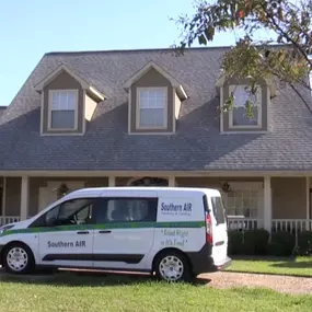 Southern Air Heating & Cooling van near house