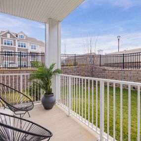 Large private patio/balcony at Glen Oaks Apartments in Wall Township, NJ.