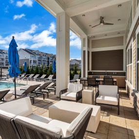 Swimming pool lounge area at Glen Oaks Apartments in Wall Township, NJ.