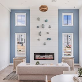 Fireside lounge area in the clubhouse at Glen Oaks Apartments in Wall Township, NJ.