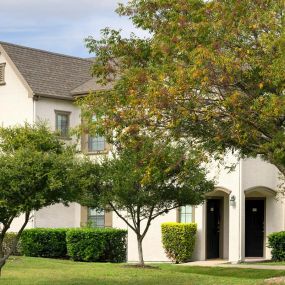 Building exterior view with greenspace