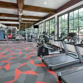 24-hour fitness center with cardio and strength equipment