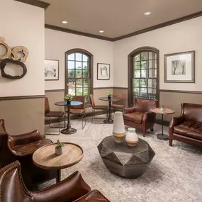 Community clubroom with plenty of seating at Camden Brushy Creek apartments in Austin, TX