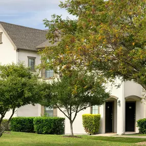 Building exterior view with greenspace