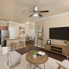 First-floor living room with wood-style floors at Camden Brushy Creek apartments in Cedar Park, TX
