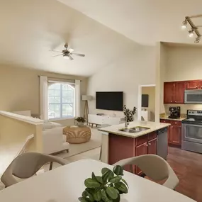 Top-floor townhome style apartment with vaulted ceilings and private stair entry at Camden Brushy Creek apartments in Cedar Park, TX