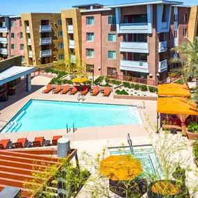 Resort style swimming pool and spa with sundeck and cabanas