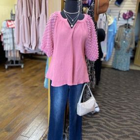 Be pretty in pink with this sweet little top! Comes in sizes S-L.