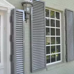 Decorative and protective colonial shutters