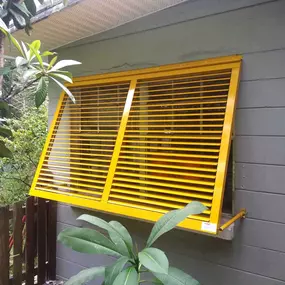 Yellow Bahama Shutters