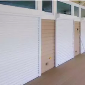 Home Safety Solutions offers traditional roll-down hurricane shutters, as well as hurricane-rated, functional Bahama and Colonial shutters for superior protection against storms.