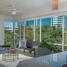 Living room with floor to ceiling windows