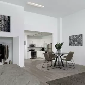 Street level apartment high ceilings studio with wood inspired flooring