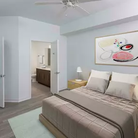 Main bedroom with ceiling fan and ensuite bath at Camden Thornton Park apartments in Orlando, FL