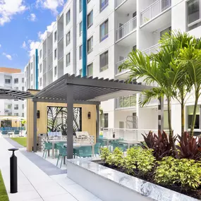 Poolside lounge area at Camden Thornton Park in Orlando, FL