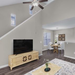 Townhome floor plan living and dining room on lower level with wood look flooring and ceiling fan
