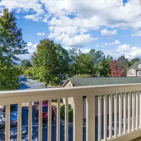 Private balcony overlooking community landscaping