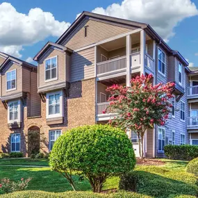 Building exterior showing private patios and balconies