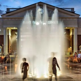 Fairfax corner cinema fountain nighttime