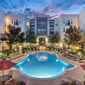 Resort style outdoor pool nighttime