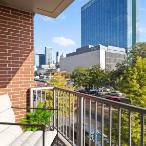 Private balcony with downtown Austin view at Camden Rainey Street apartments in Austin, TX