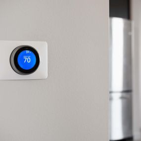 Smart programmable thermostat in every apartment home