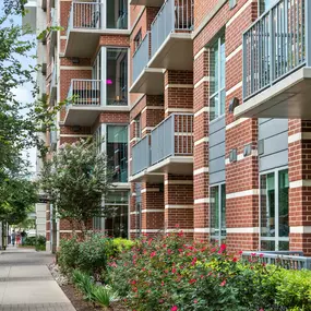 Building exterior view showing patios and balconies