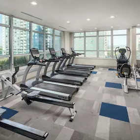 24-hour fitness center with urban views at Camden Rainey Street apartments in Austin, TX