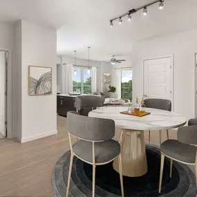 Dining space and two bedrooms at Camden Rainey Street