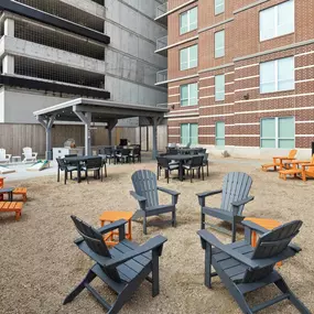 Backyard resident lounge with grills at Camden Rainey Street apartments in Austin, TX