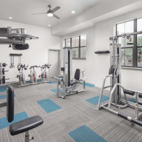 24-hour fitness center strength machines at Camden Farmers Market apartments in Dallas, TX
